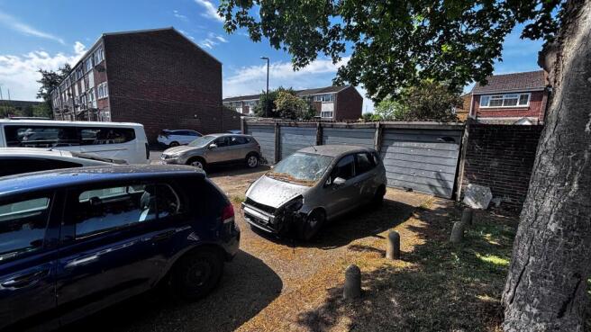 Land, in Garages and Land at Spackmans Way, £35,000
