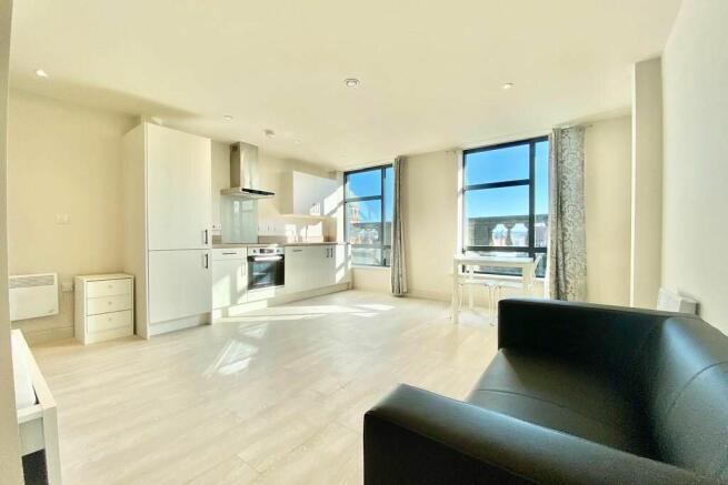 Land, in Flat 42, £90,000