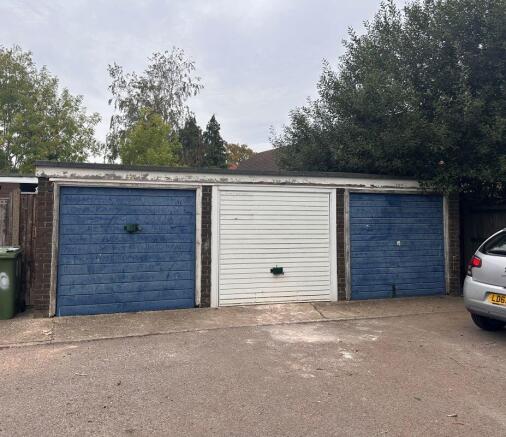 Land, in Garages and land at Giffard Drive, £82,500