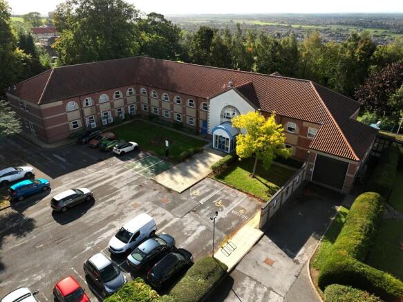 Land, in Existing Office Building With Development Potentia, £1