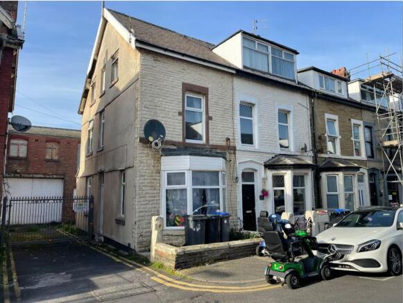 Land, in 6 Lowrey Terrace, £55,000