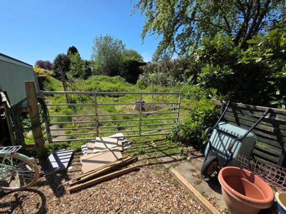 Land, in Land Rear of, £10,000