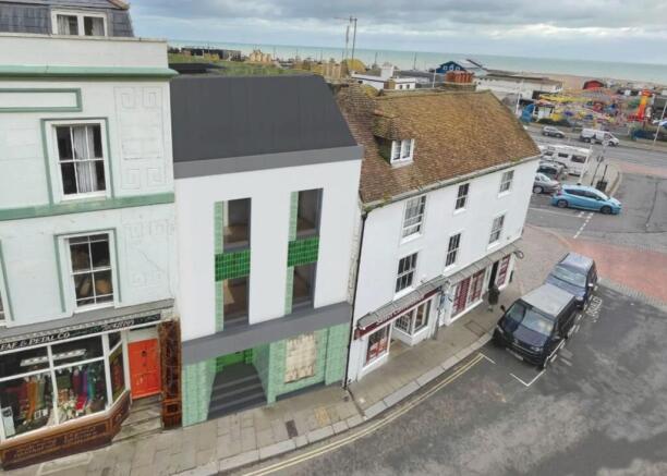 Land, in High Street, £250,000