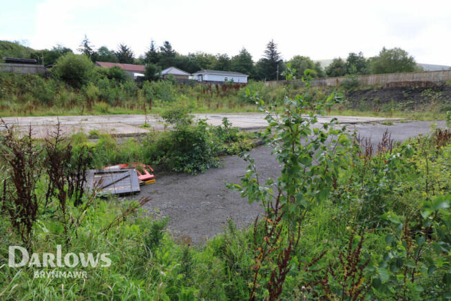 Land, in High Street, £400,000