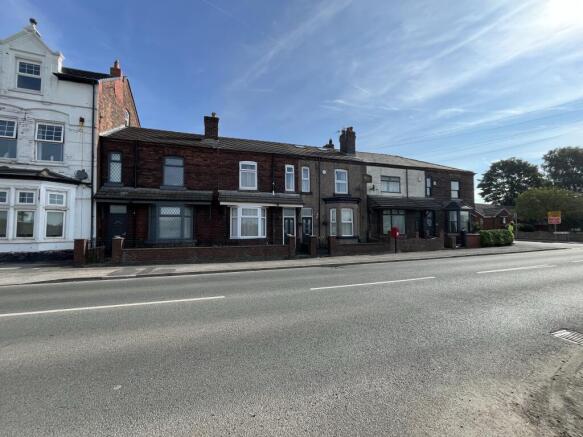 Land, in 325-333 Bickershaw Lane, £5,000