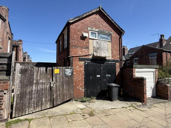 Land, in 34 Carrington Road, £50,000