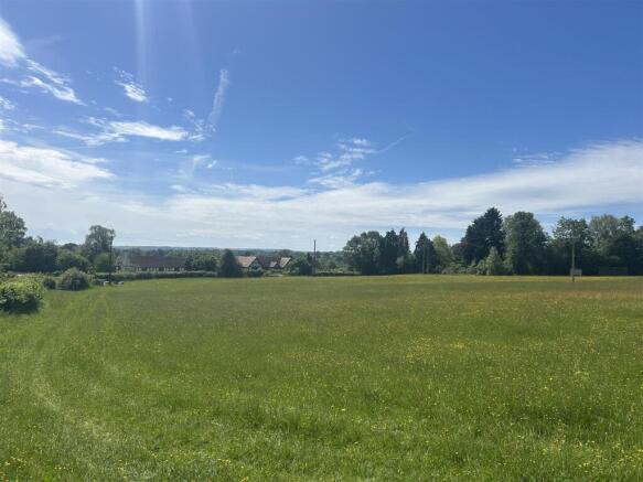 Land, in Overton Lane, £125,000