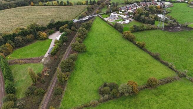 Land, in Coote Lane, £250,000