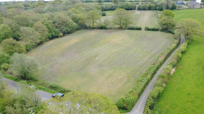 Land, in Approximately 8.10 acres of land, £75,000