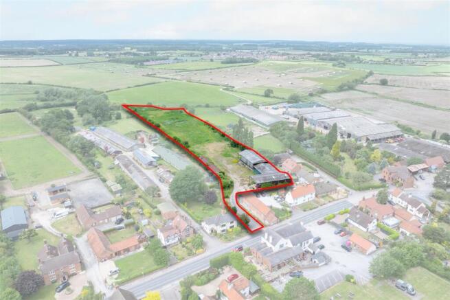 Land, in Main Street, £300,000