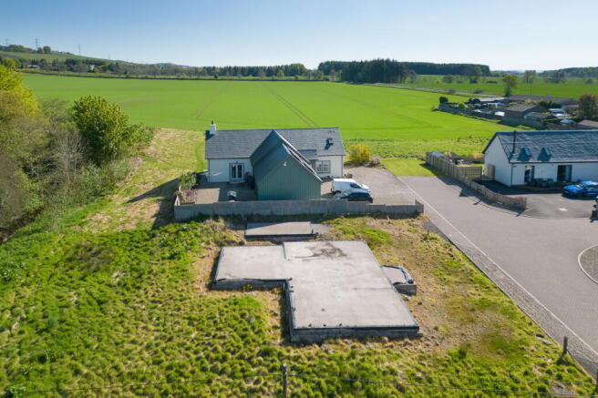 Land, in Memus Manse, £125,000