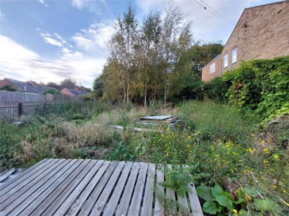 Land, in Wellfield Road, £120,000