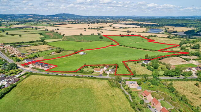 Land, in Main Road, £875,000