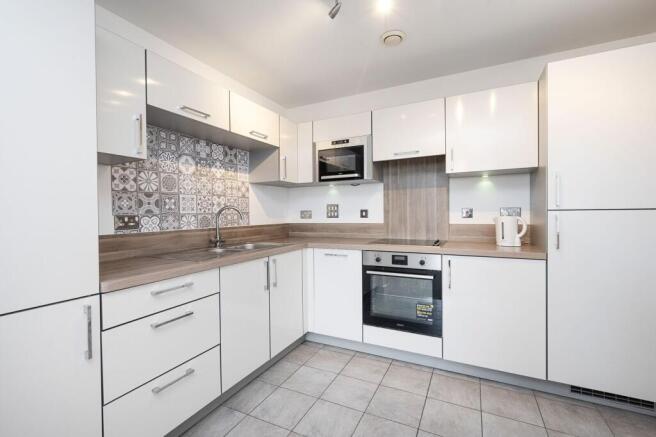 2 bed property, in Dalston Square, £450,000