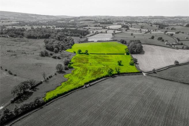 Land, in Wennington, £150,000
