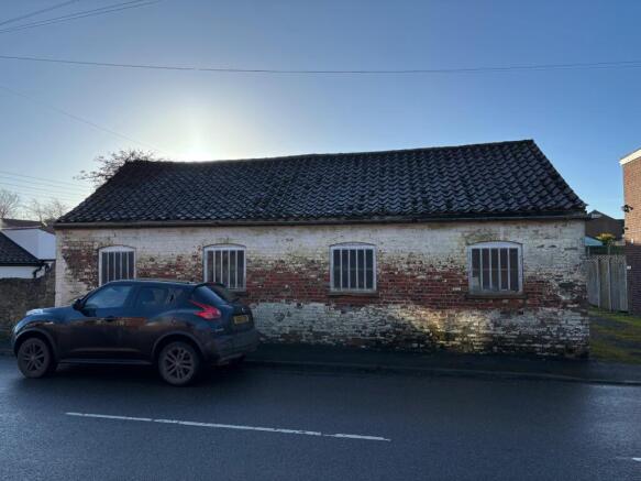 Land, in 77 - 79 High Street Wootton, £140,000