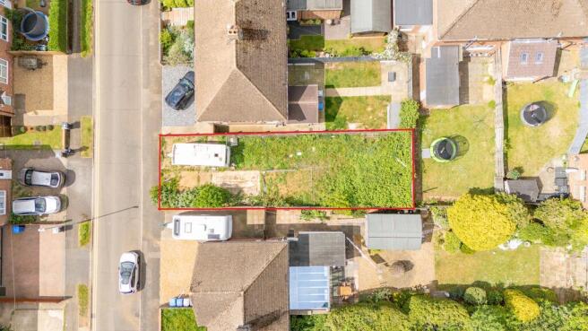 Land, in Elm Road, £80,000
