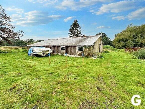 Land, in Three Cross Road, £350,000