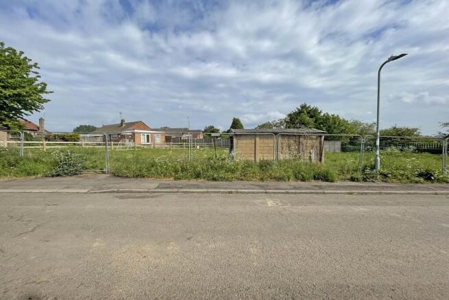 Land, in Church Lane, £300,000