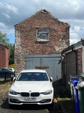 Land, in Unit to the Rear of 126 Water Street, £9,500