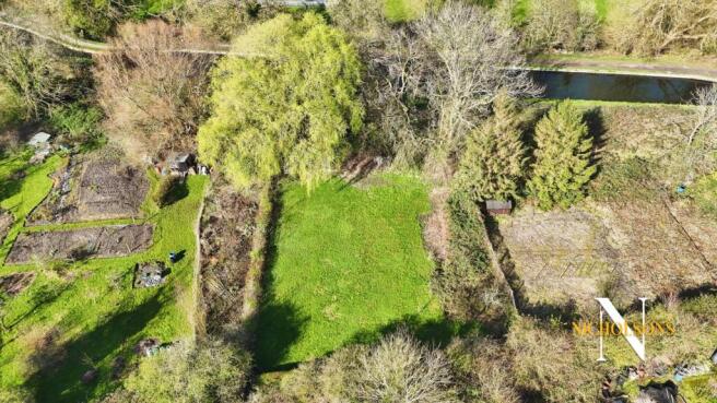 Land, in A 1/4 acre of allotment land off Albert Road, £7,500