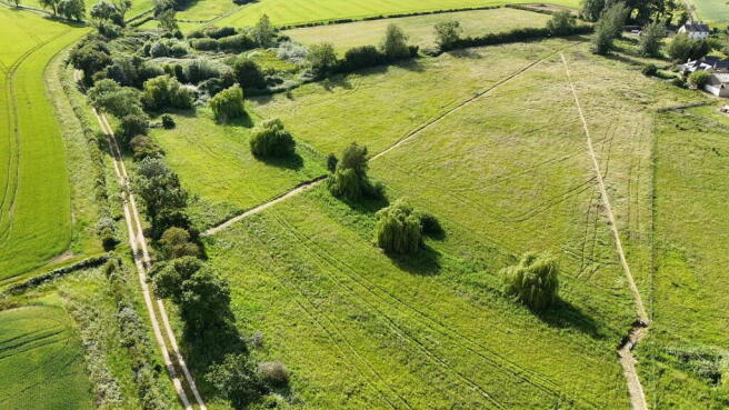 Land, in Barn and Paddocks, £195,000