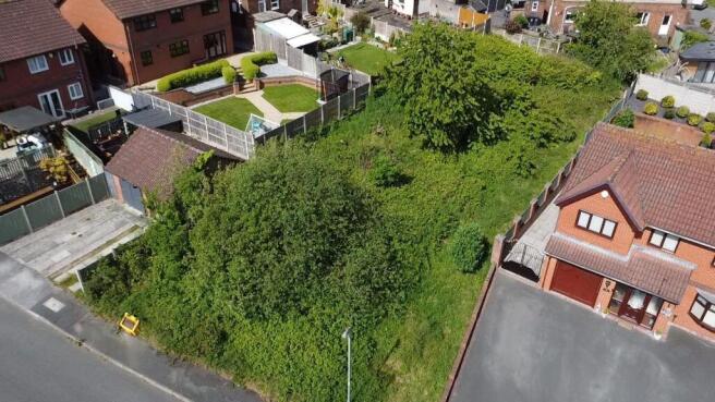 Land, in Vicarage Road, £60,000