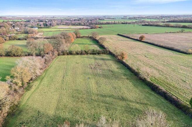 Land, in Watery Lane, £100,000