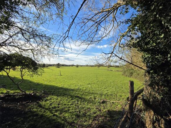 Land, in Chertsey Lane, £2,000,000