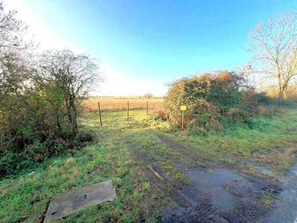 Land, in Land adjacent to, £32,000