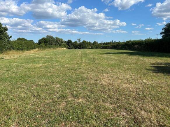 Land, in Whitechurch Lane, £400,000