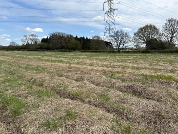 Land, in 25.82 ac of Arable Land off Birker Lane, £240,000