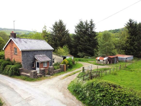 Land, in Carno, £180,000