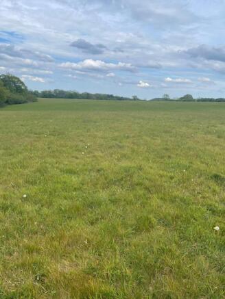 Land, in Land north of Washpond Lane, £30,000