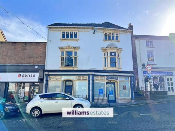 Land, in High Street, £180,000